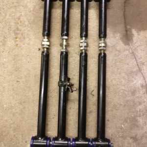Four tie bars on threaded bar to make sure they're all exactly the same length