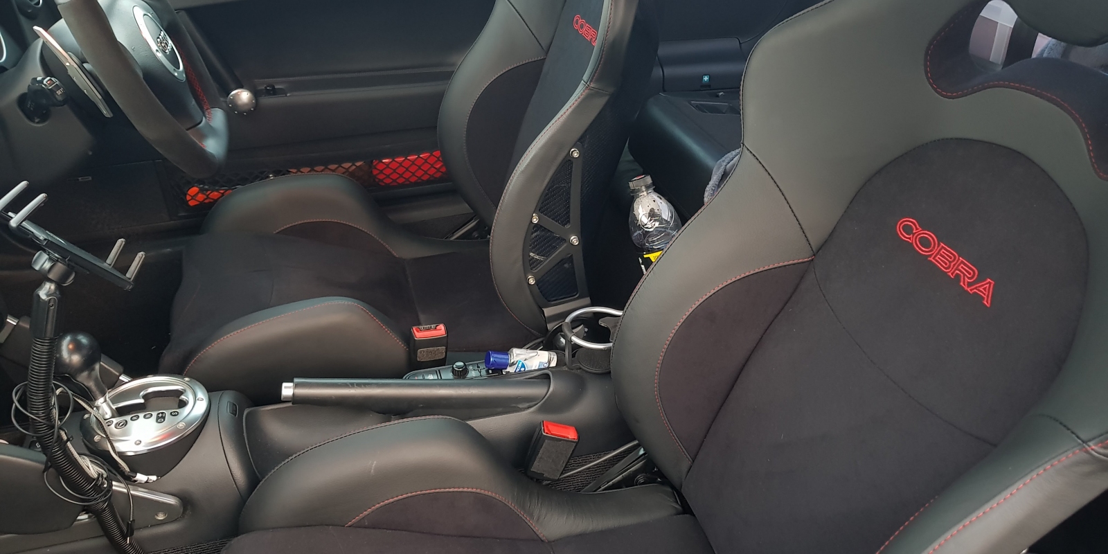 A pair of Cobra Misano Lux seats fitted in Shed